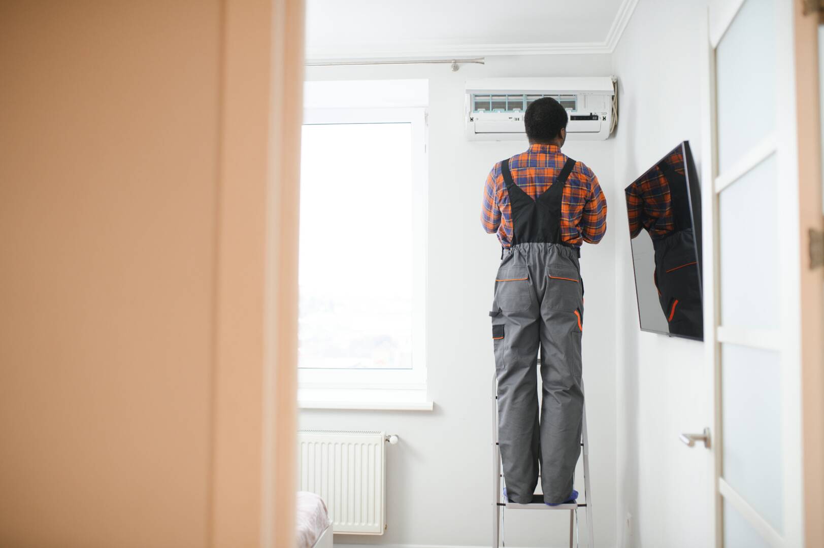 AC Electrician Technician Repairing Air Conditioner Appliance.